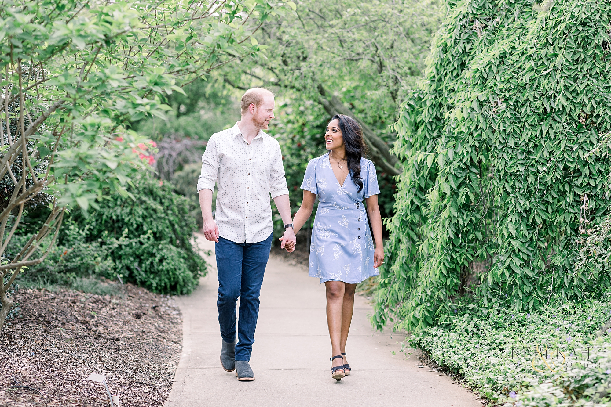 Custom gold engagement ring. Raleigh engagement photography taken at the JC Raulston Arboretum and Downtown Raleigh North Carolina. Photography by Rebekah & Grace Photography.