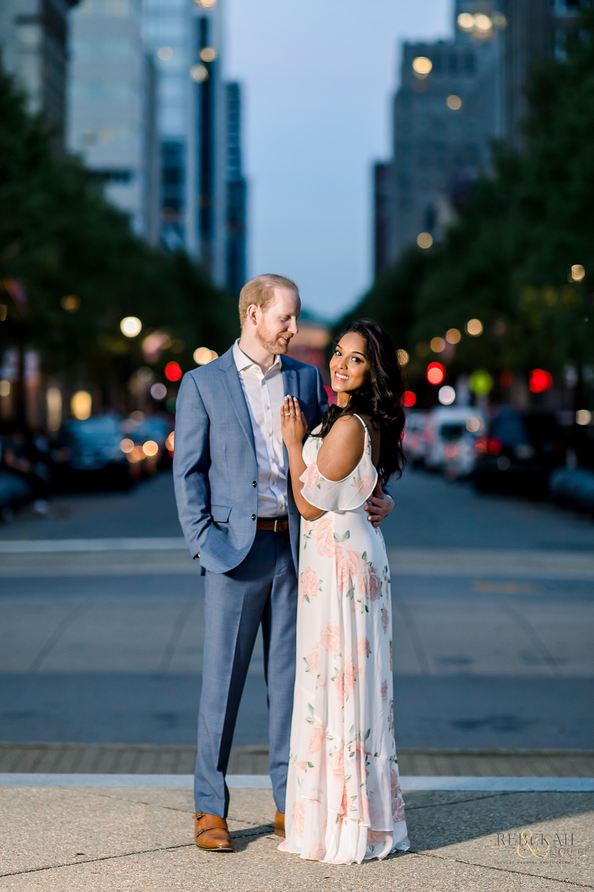 Engagement Photography | Night city lights in Downtown Raleigh, North Carolina. | Photography by Rebekah & Grace Photography.