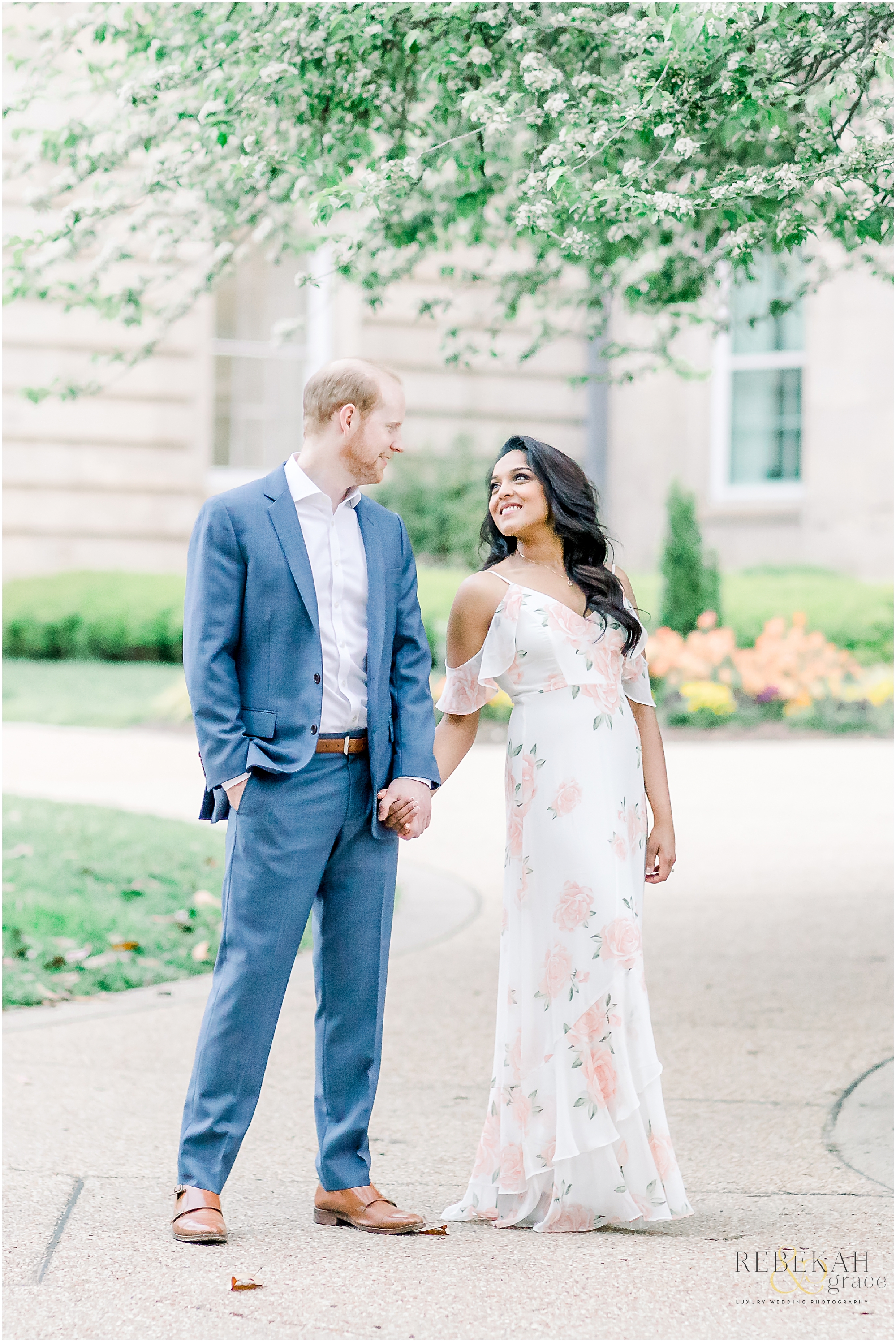 Custom gold engagement ring. Raleigh engagement photography taken at the JC Raulston Arboretum and Downtown Raleigh North Carolina. Photography by Rebekah & Grace Photography.